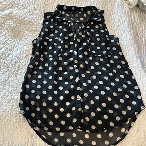 Womens polka dot, satin, sleeveless blouse.